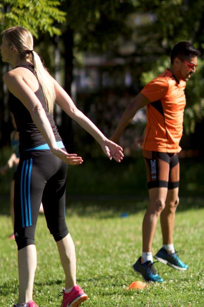 Group training outdoor squat jump